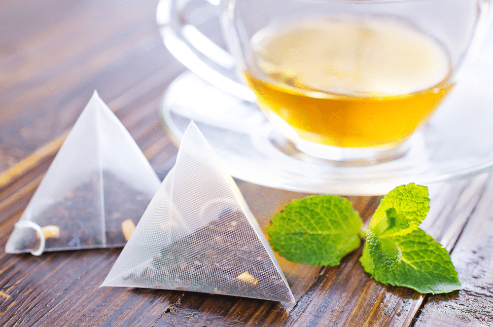 tea bags with cup of tea