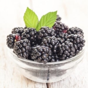 blackberries in transparent bowl