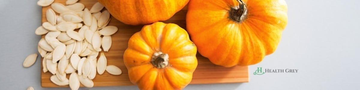 Pumpkin and seeds on cuting board